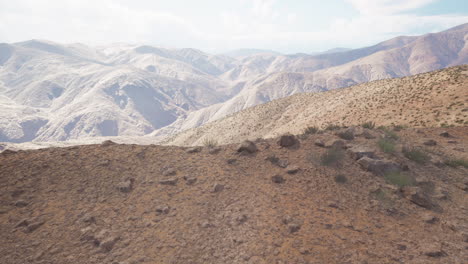 a scenic view of a mountain range in the desert