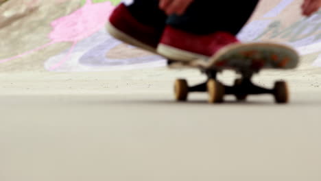 Young-skateboarder-skating-the-outdoor-skatepark