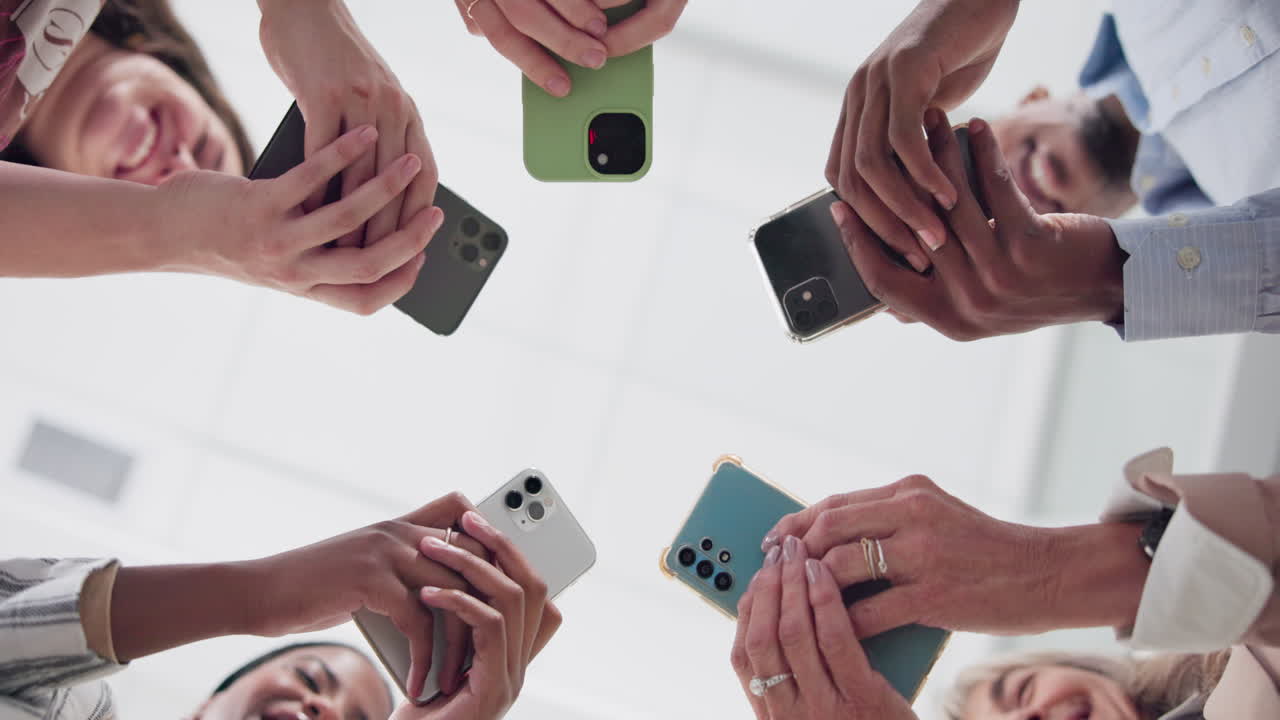 Diverse Group Holding Smartphones in Unity