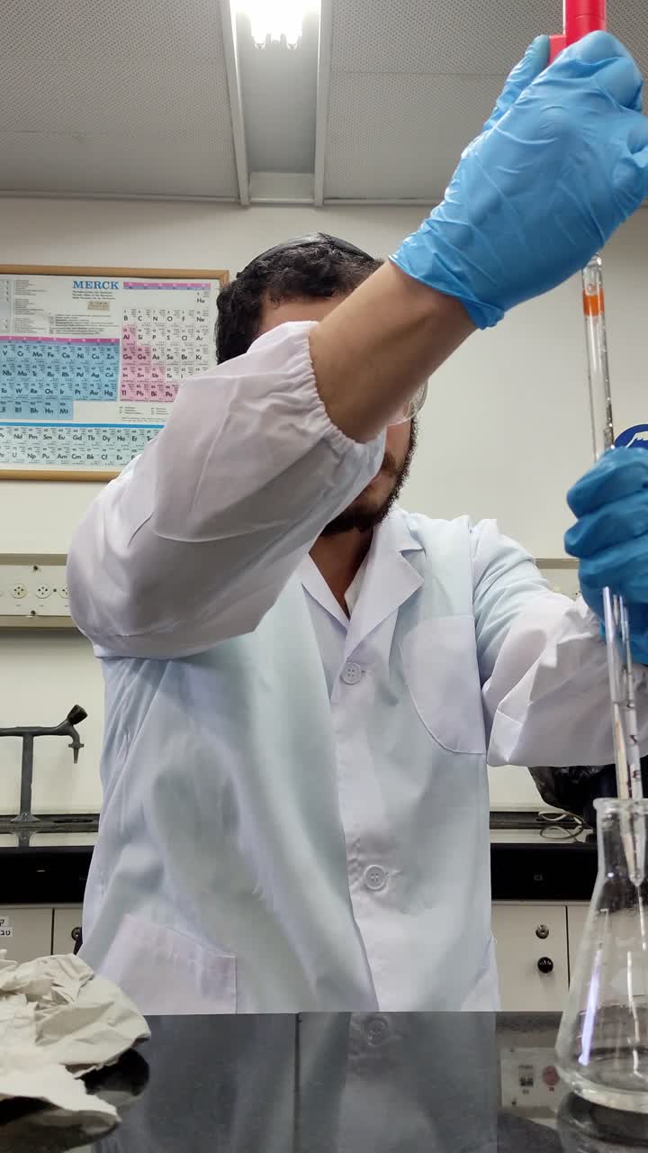 Scientific Procedure in Progress with Pipette