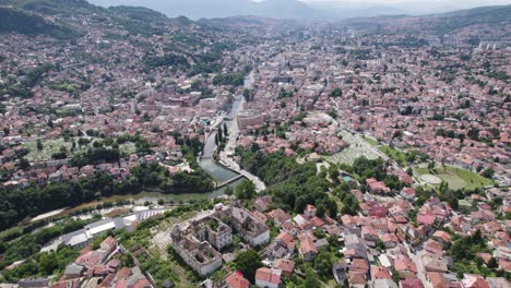 Aerial-of-Sarajevo-with-Miljacka-River,-Bosnia-and-Herzegovina