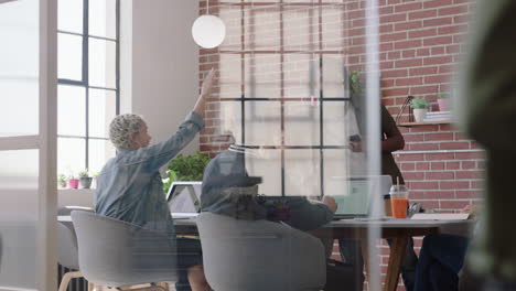 happy-business-people-high-five-celebrating-successful-startup-project-enjoying-teamwork-celebration-in-multi-ethnic-office-meeting