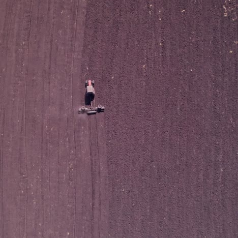 aerial view of tractor plowing a field