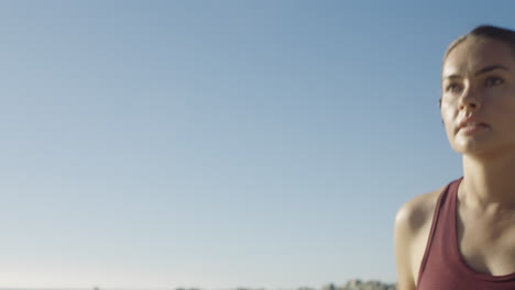 woman, running and face of an athlete outside