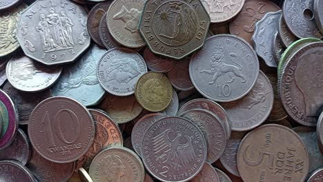 pile world coins from different countries