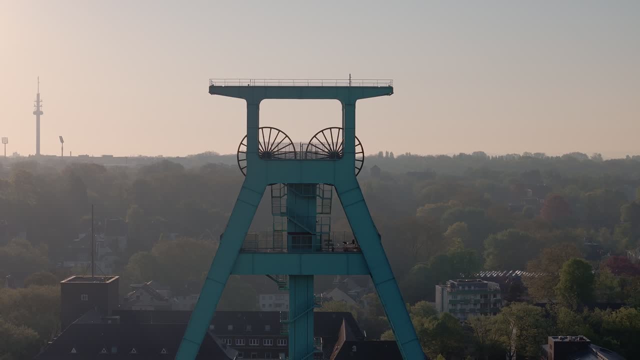 Aerial close up of Bochum Mining Museum shaft tower. Landmark and tourist attraction in Germany.
