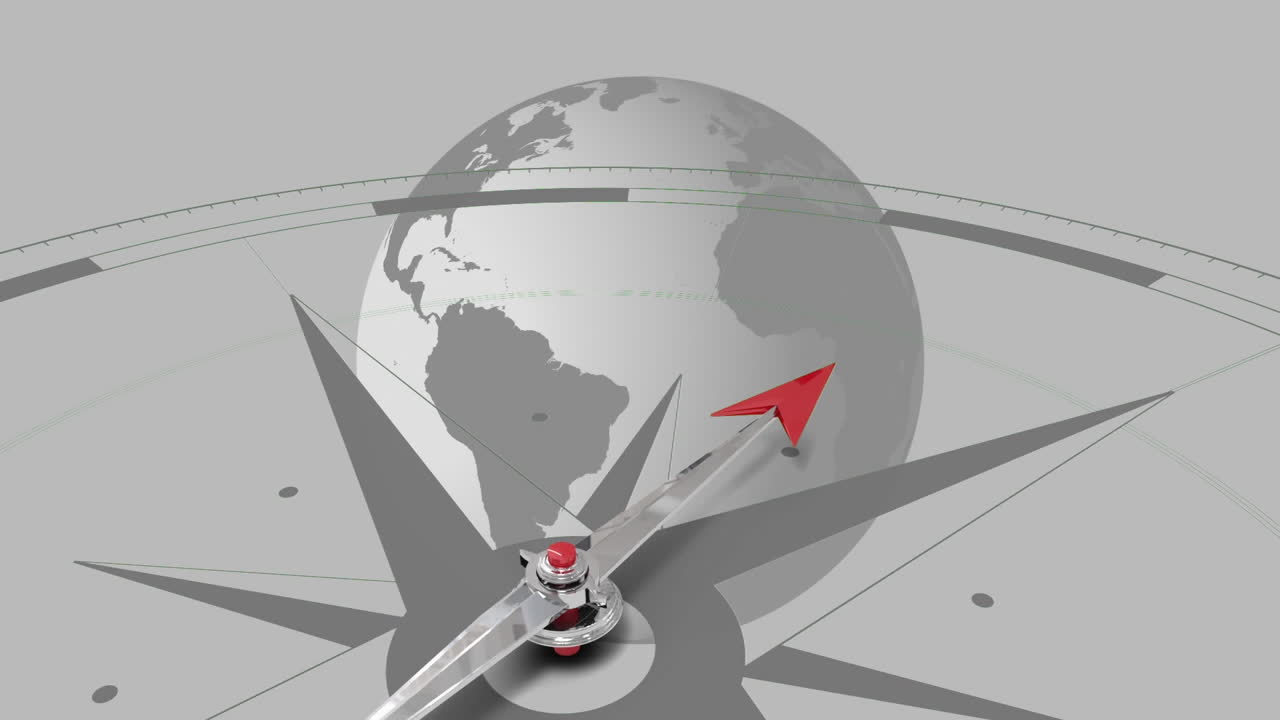 brújula contra el globo giratorio
