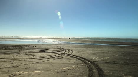 moody sweeping shot of a new zealand river mouth