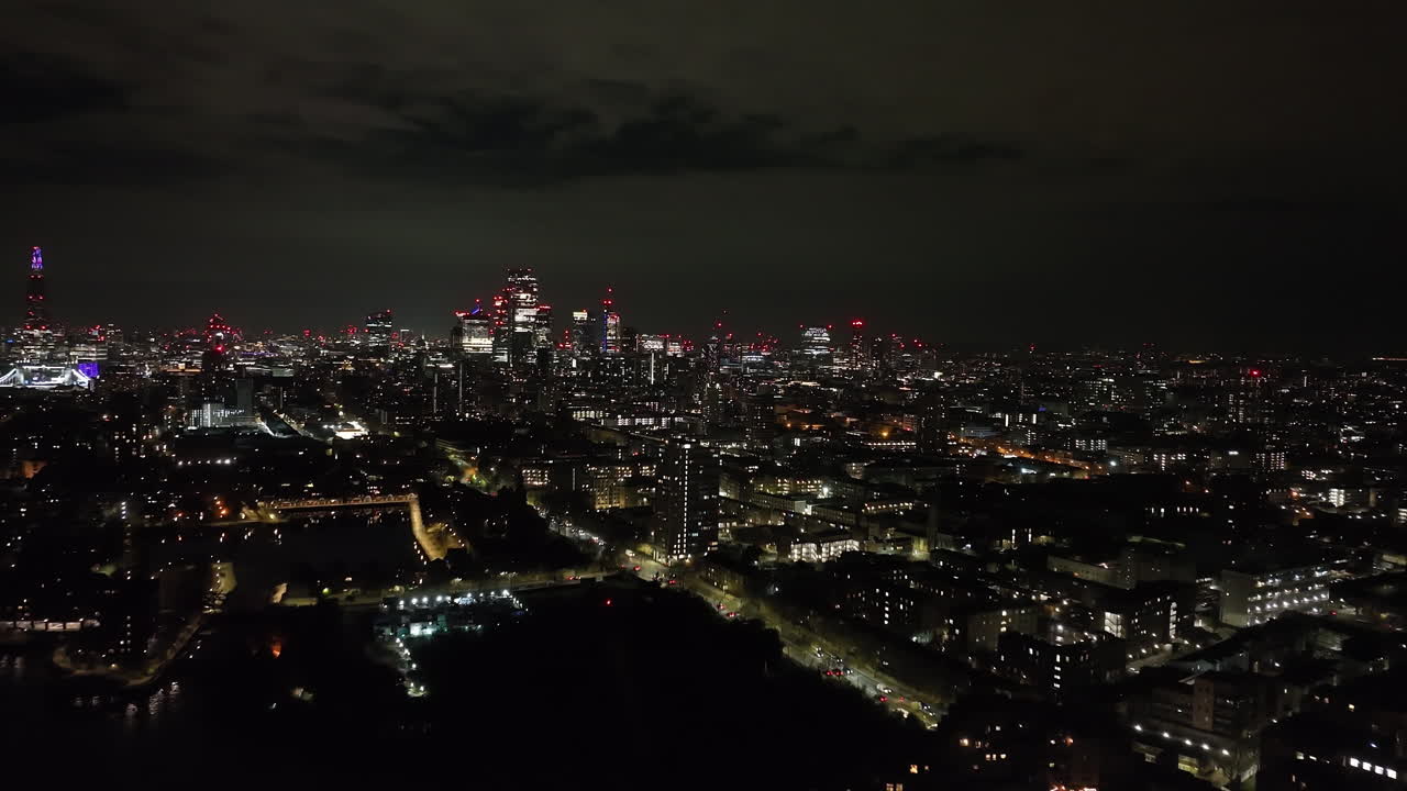 Establishing drone shot of traffic in Shadwell, evening in London city, England