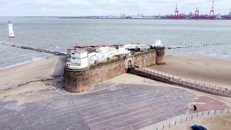 fort perch rock new brighton sandstone coastal defence battery museum peel port and lighthouse aerial view orbit left