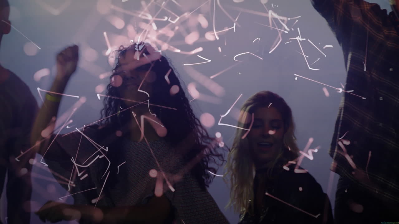 Group dancing and singing in studio, showcasing music technology with floating orbs, light trails