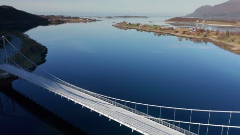 aerial view of the trongstraumen bridge spanning above the fjord