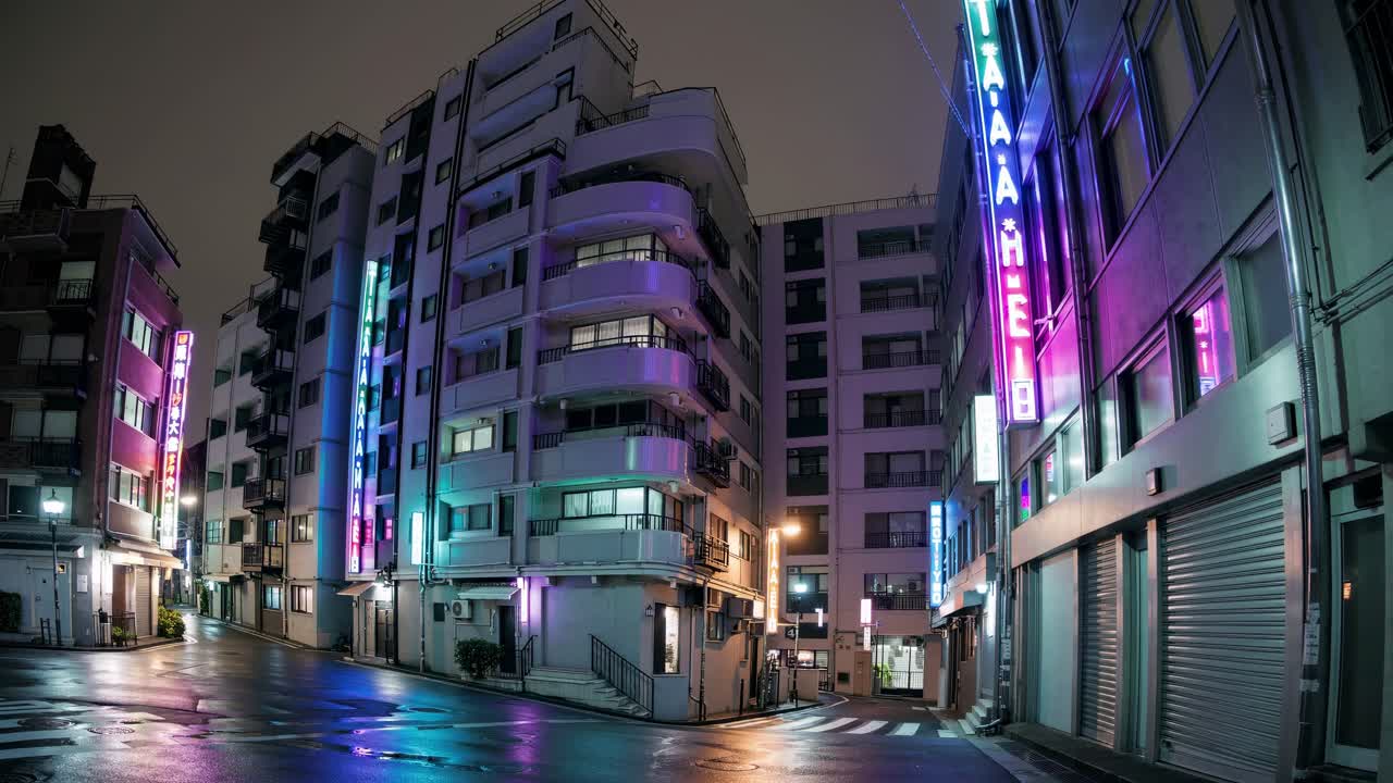 Wet streets reflecting vibrant neon lights from businesses and hotels, creating a dazzling atmosphere in Tokyo at night with a captivating fisheye perspective