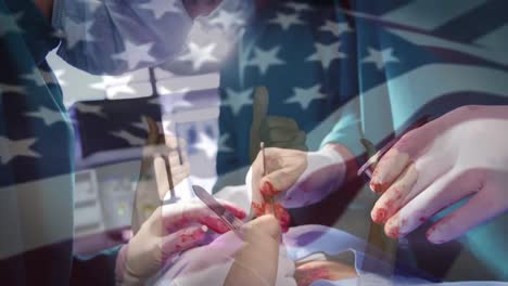 Animation-of-flag-of-united-states-of-america-waving-over-surgeons-in-operating-theatre