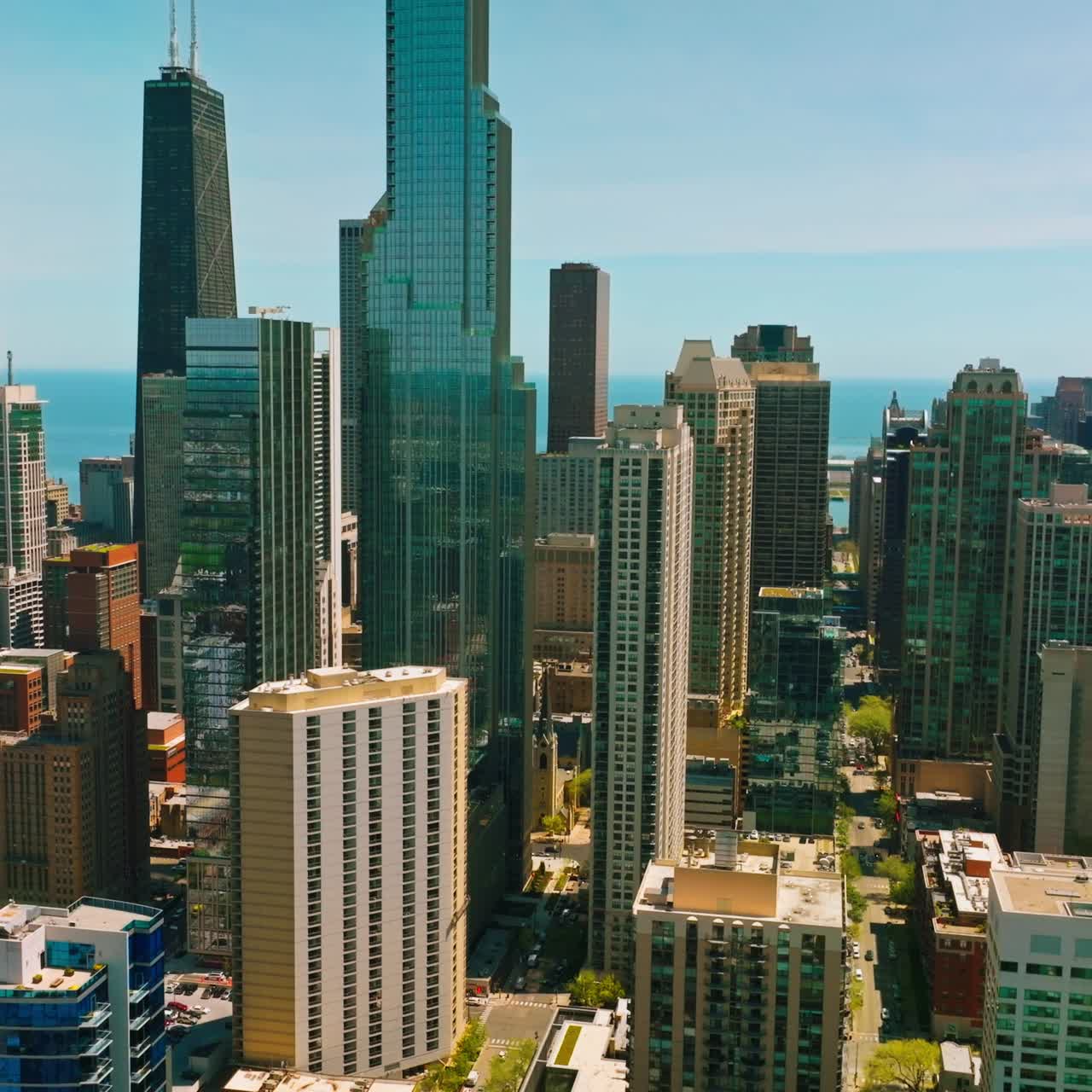 Stunning diverse skyscrapers of Chicago city. Modern architecture at the backdrop of blue sky