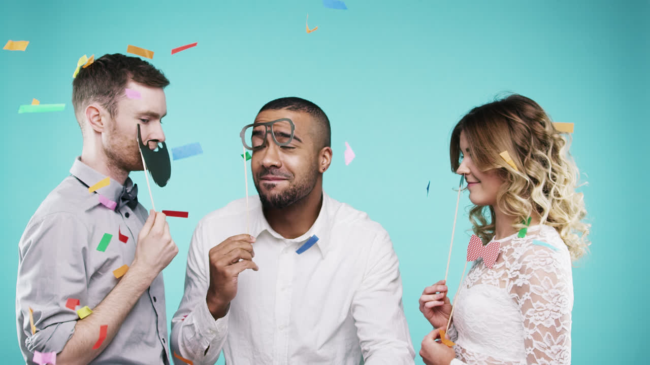 Mixed race man dancing with friends slow motion party photo booth