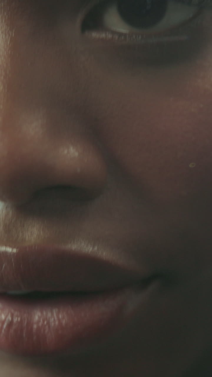 Detailed Close-up of a Woman's Face, Eye, and Lips