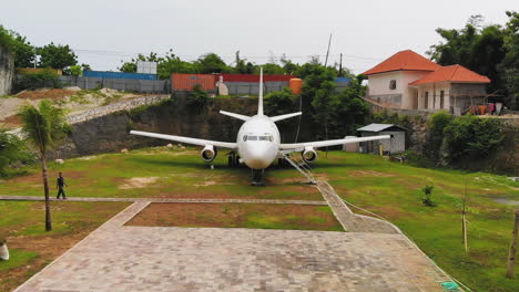 aerial video of an abandoned airplane on the island of bali, indonesia