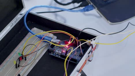 Close-up-of-electronic-circuit-of-a-computer-with-its-cables-in-operation