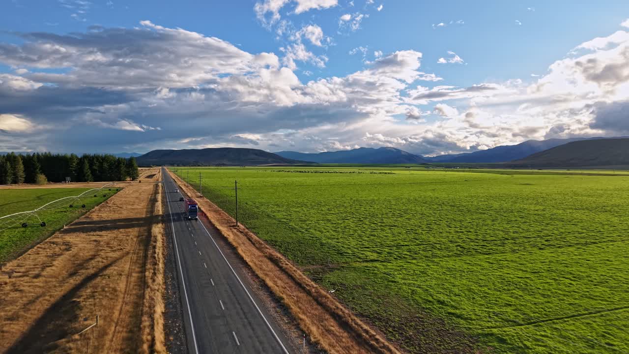 Vast farmland in Canterbury, New Zealand with sunny skies and open fields