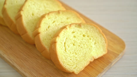 potatoes-bread-sliced-on-wood-board