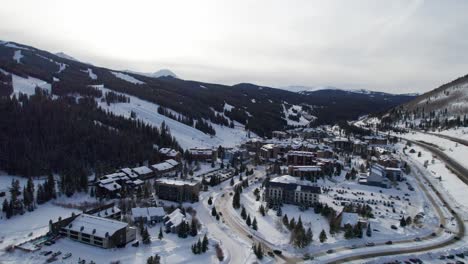 Aerial-view-of-a-busy-ski-village-in-Colorado-outside-of-Denver-in-the-winter