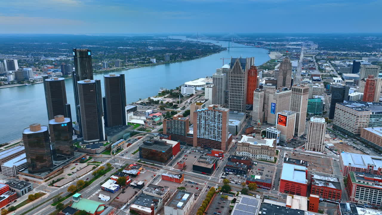 Detroit, USA, 28 July 2025: Dusk time scenery of modern Detroit, Michigan, USA. Drone footage near the Renaissance Center at the Detroit River waterfront