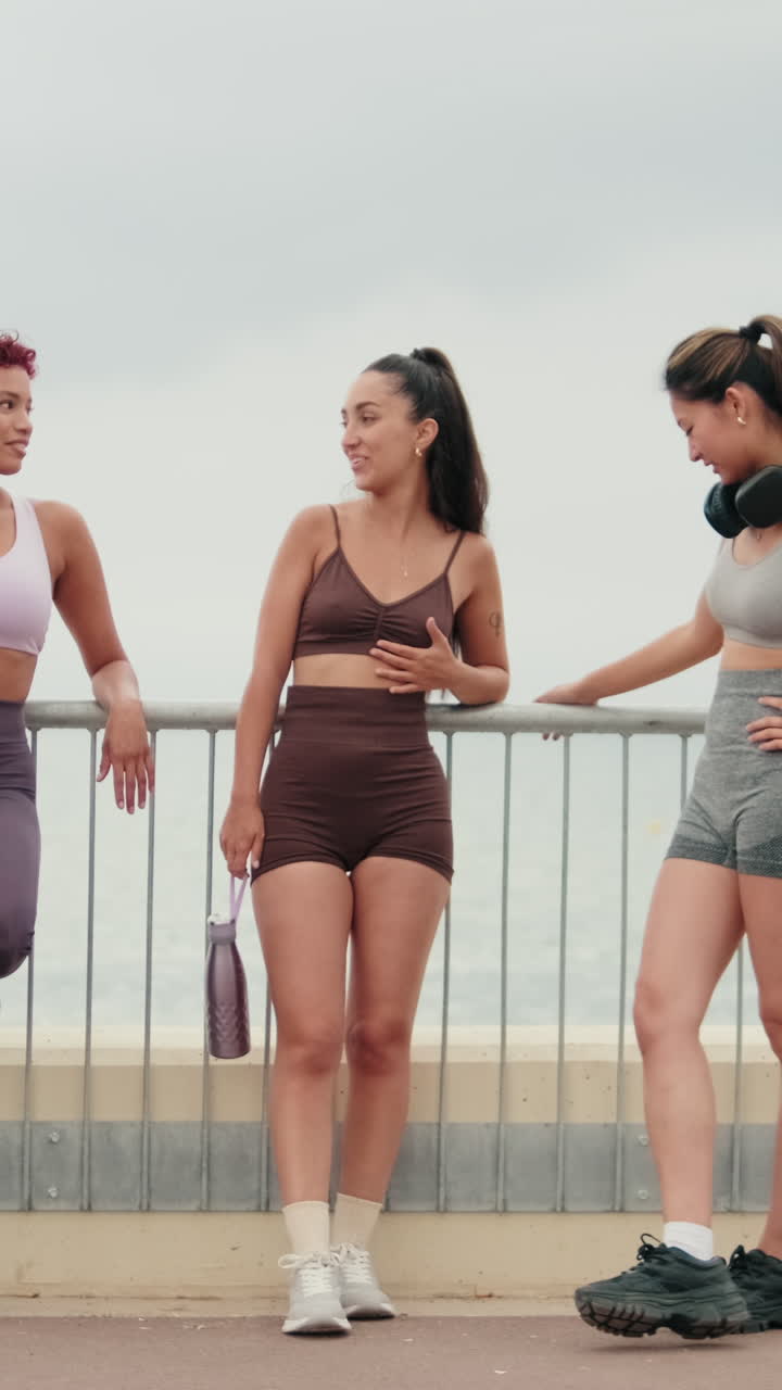 Fit Friends Chat After Beach Workout