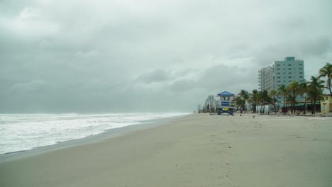 tropical storm, empty beach on a windy and rainy day