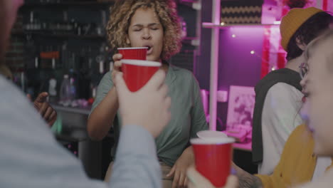 friends celebrating with red cups