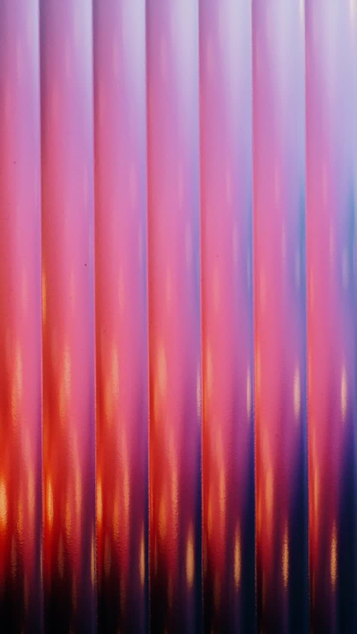Colorful Sunset Reflection Through Blinds