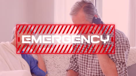 word emergency written in red frame over over seniors sitting at home. covid-19 spreading