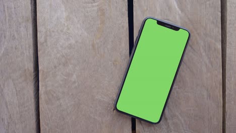 smartphone place on wood background