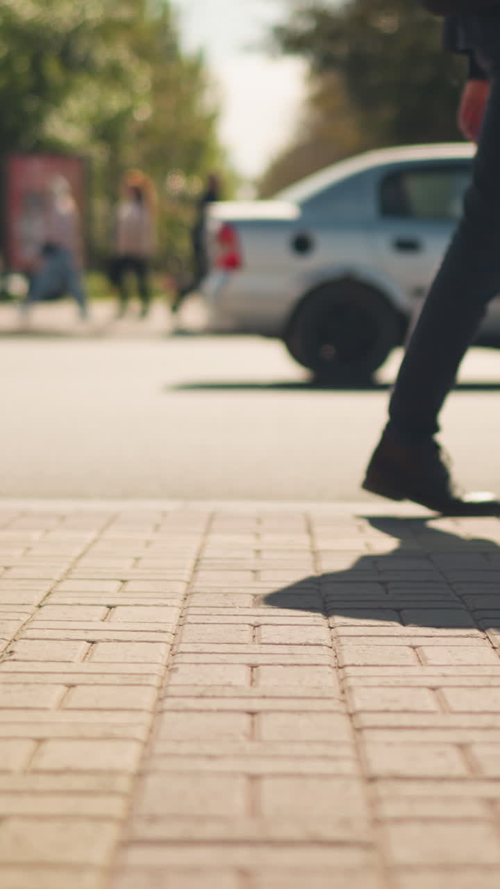 bustling brick crosswalk with rushing commuters, dynamic lowangle shots of feet and briefcases, cars waiting in background, varied footwear including sneakers and heels, fast urban commute energy