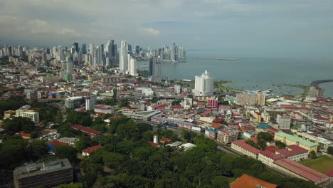 Beautiful-Aerial-Pan-of-Panama-City,-Panama-on-Sunny-Day,-Drone-Pan