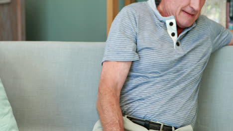 thoughtful senior man sitting