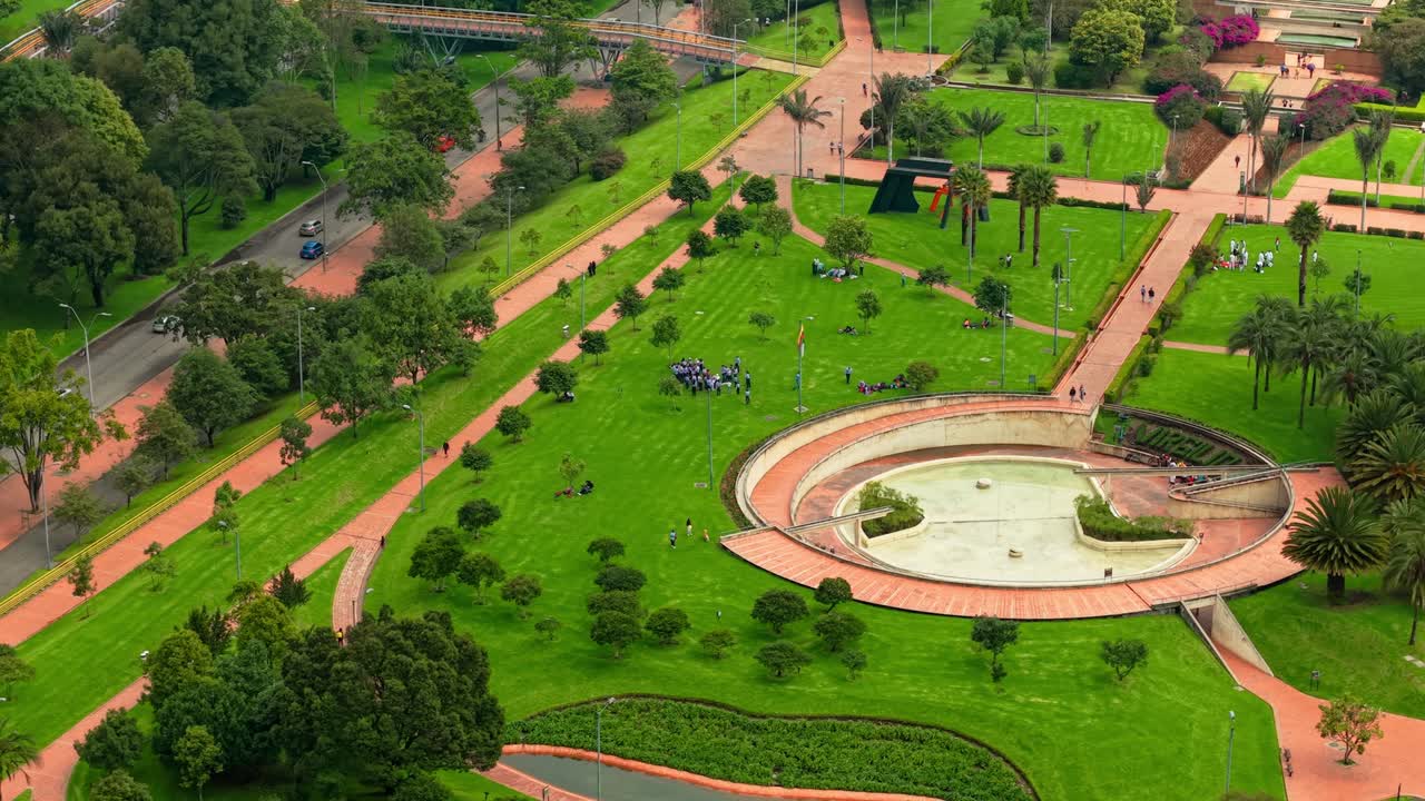 Virgilio Barco Park aerial orbit, 70mm isolated shot in a natural environment, Bogota, Colombia. Low traffic