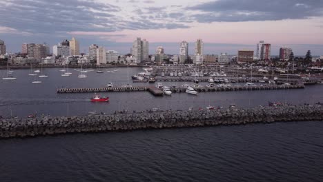 Dramatic-view-of-fishing-boat-reaching-the-port-of-Punta-del-Este-city-in-Uruguay