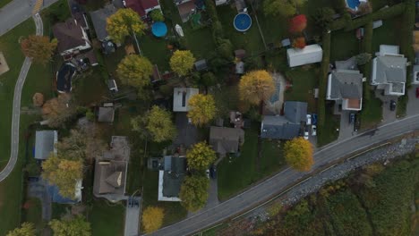 straight vertical overhead aerial drone shot of houses in residential neighborhood
