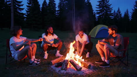 Friends Enjoying a Campfire at Night in the Forest
