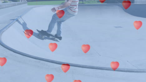 animación de globos en forma de corazón sobre un niño caucásico haciendo skateboard