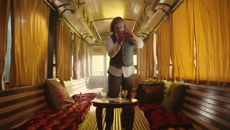 vintage train carriage interior with man