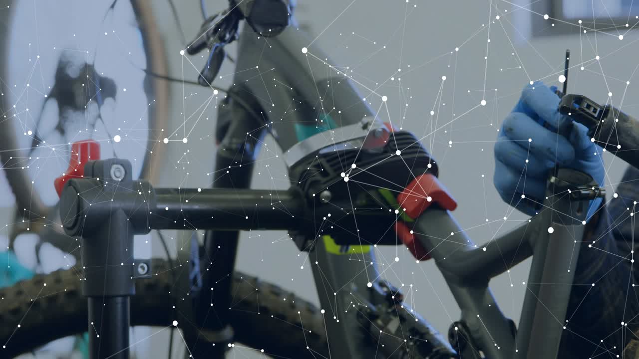 HUD popping in repair shop over bike while male tech adjusting seatpost and checking metrics