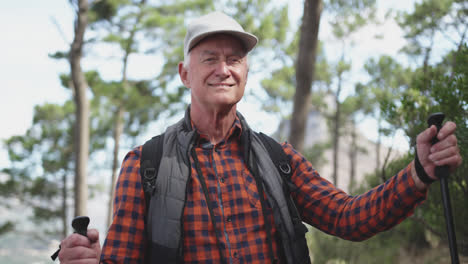 Front-view-of-active-senior-man-in-the-forest