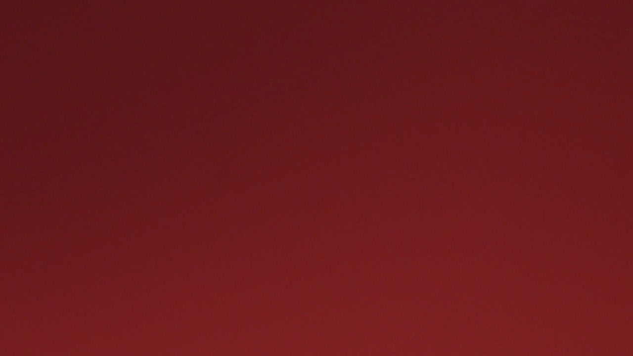 Dynamic Red and Orange Light Leak Film Burn Transition