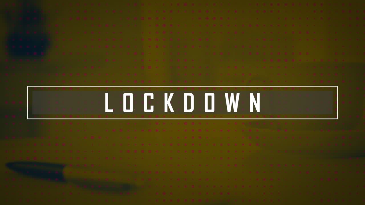 Lockdown text banner against rows of multiple dots against office table