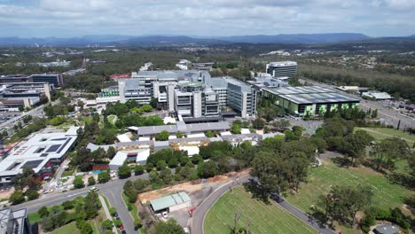 aerial view of gold coast university hospital in southport, australia - drone shot