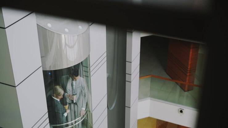 Business People in an Elevator