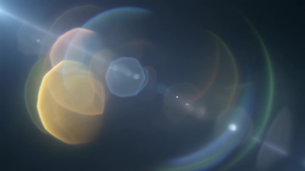 Abstrakt filmisk linseflare-overlay på mørk baggrund