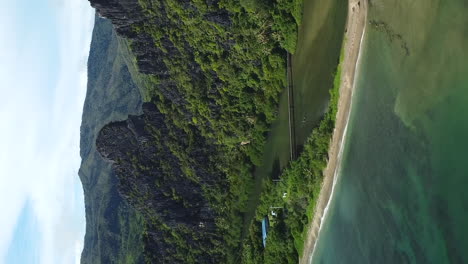 Aerial-dolly-out-of-majestic-Linderalique-rocks-near-Hienghene,-New-Caledonia